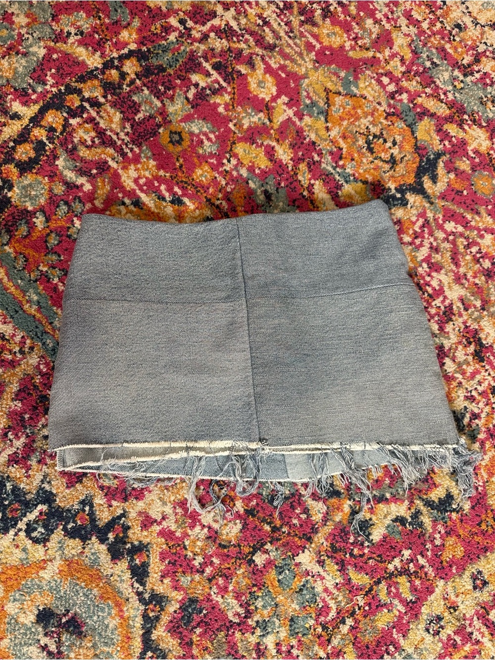 Revolve Denim Mini Skirt with Frayed Hem